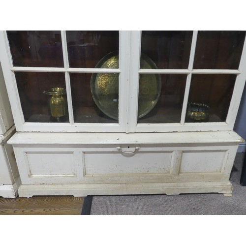 651 - A very large 19th century painted pine glazed Bookcase, with later additions, made up of three secti... 