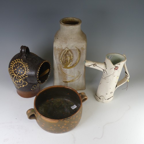 4 - A large quantity of Studio Pottery, including an abstract Jug with riveted effect, H 23cm, also with... 