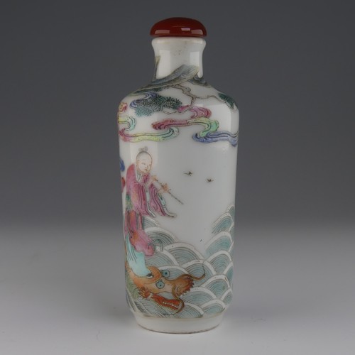 105 - A Chinese famille rose porcelain Snuff Bottle, decorated in fine enamels of an elder riding a dragon... 