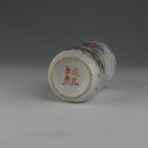 105 - A Chinese famille rose porcelain Snuff Bottle, decorated in fine enamels of an elder riding a dragon... 