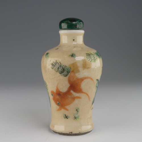 106 - A Chinese celadon porcelain Snuff Bottle, of shouldered baluster form, decorated with koi karp and f... 