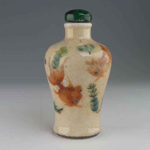 106 - A Chinese celadon porcelain Snuff Bottle, of shouldered baluster form, decorated with koi karp and f... 