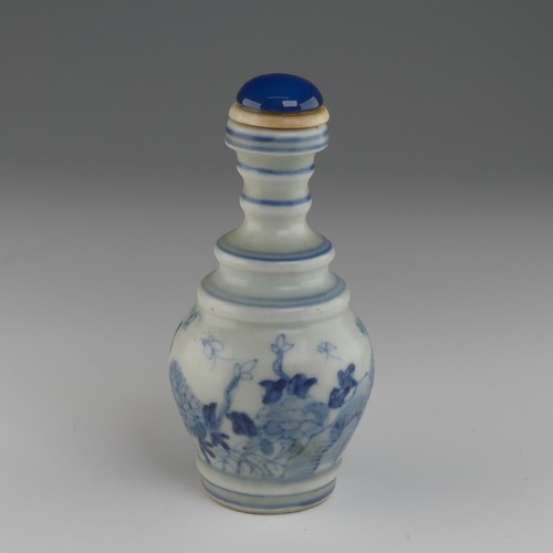 106 - A Chinese celadon porcelain Snuff Bottle, of shouldered baluster form, decorated with koi karp and f... 