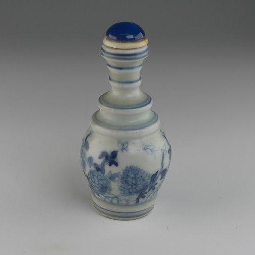 106 - A Chinese celadon porcelain Snuff Bottle, of shouldered baluster form, decorated with koi karp and f... 