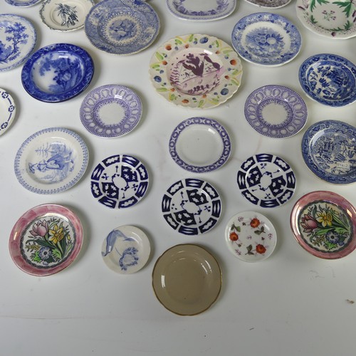 12 - A quantity of antique Child's pottery Plates, to comprise primarily blue and white transfer ware, to... 