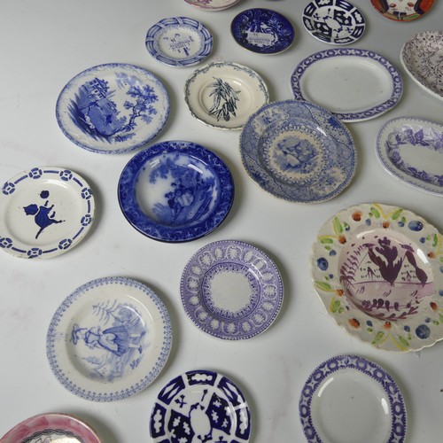 12 - A quantity of antique Child's pottery Plates, to comprise primarily blue and white transfer ware, to... 