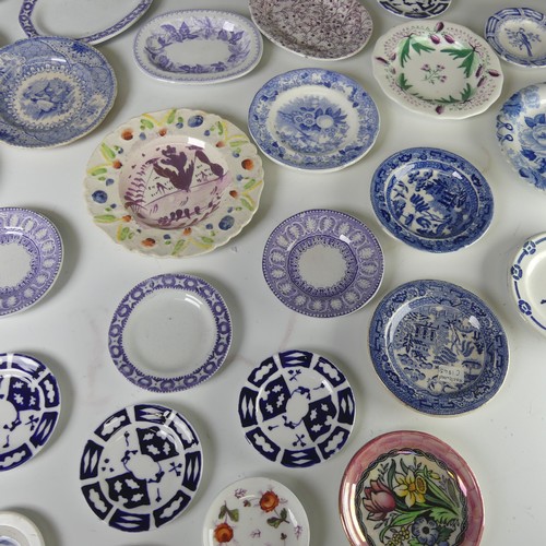 12 - A quantity of antique Child's pottery Plates, to comprise primarily blue and white transfer ware, to... 