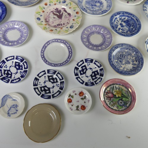 12 - A quantity of antique Child's pottery Plates, to comprise primarily blue and white transfer ware, to... 