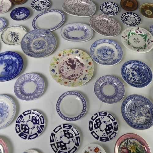 12 - A quantity of antique Child's pottery Plates, to comprise primarily blue and white transfer ware, to... 