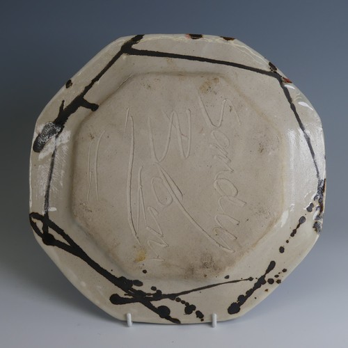 30 - Sandy Brown (b. 1946) a studio pottery Dish, of octagonal form decorated in colourful slips, D 28cm,... 