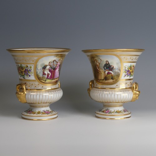 40 - A pair of late 19thC French porcelain Urns, decorated with gilded bands of vines, with central depic... 