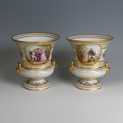 40 - A pair of late 19thC French porcelain Urns, decorated with gilded bands of vines, with central depic... 