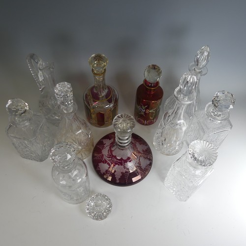 42 - A 19th century ruby flash glass ship's Decanter, with etched grape and vine decoration, together wit... 