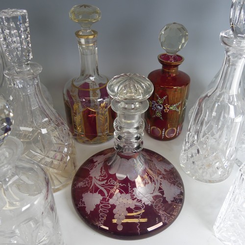 42 - A 19th century ruby flash glass ship's Decanter, with etched grape and vine decoration, together wit... 