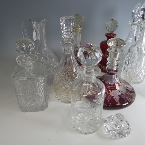 42 - A 19th century ruby flash glass ship's Decanter, with etched grape and vine decoration, together wit... 