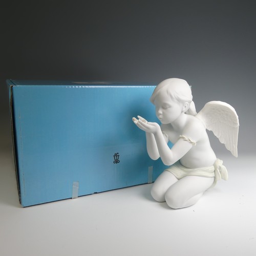 43 - A Lladro figure of 'A Fantasy Breath', modelled as an angel girl blowing flower petals, H 25cm. Boxe... 