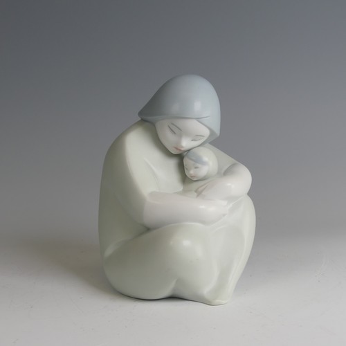 44 - A Lladro figure of 'Moon Mother', of stylised form, boxed, H 13.5cm, together with a Lladro figure o... 