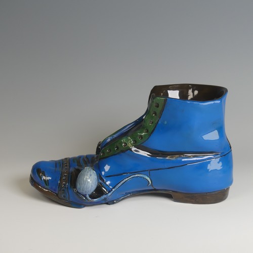 58 - A C. H. Brannam pottery Cache Pot, in the form of an old boot being nibbled at by two mice, the blue... 