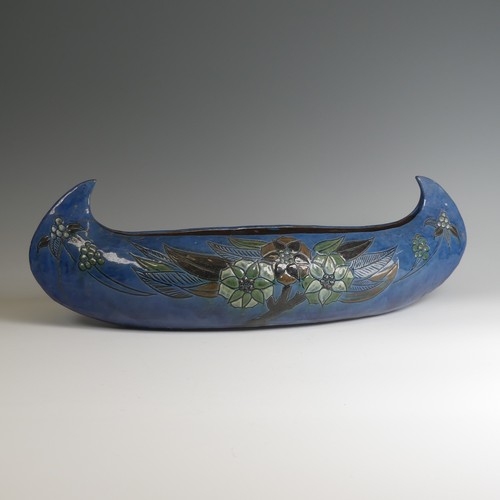 72 - A C. H. Brannam navette Bowl, of large proportions, decorated with trio of flora to the centre, inci... 