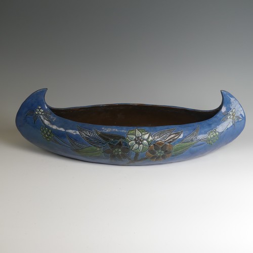 72 - A C. H. Brannam navette Bowl, of large proportions, decorated with trio of flora to the centre, inci... 