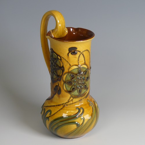 73 - Frederick Braddon for C. H. Brannam pottery Jug, with bulbous base and cylindrical neck, decorated i... 