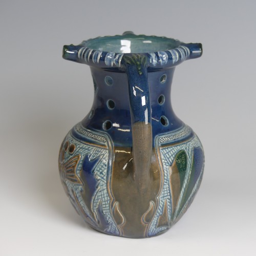 74 - Alexander Lauder, Barum Pottery Puzzle Jug, decorated in blues, browns and green with fish depiction... 