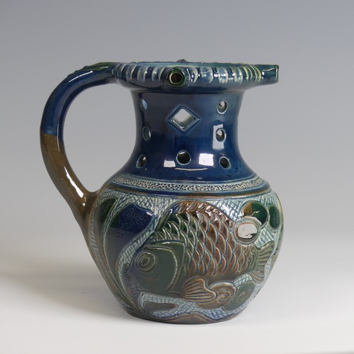 74 - Alexander Lauder, Barum Pottery Puzzle Jug, decorated in blues, browns and green with fish depiction... 