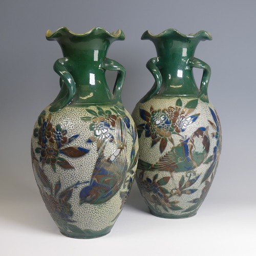 76 - Alexander Lauder, Barum Pottery; a pair of large three-handled Vases, of baluster form, decorated in... 