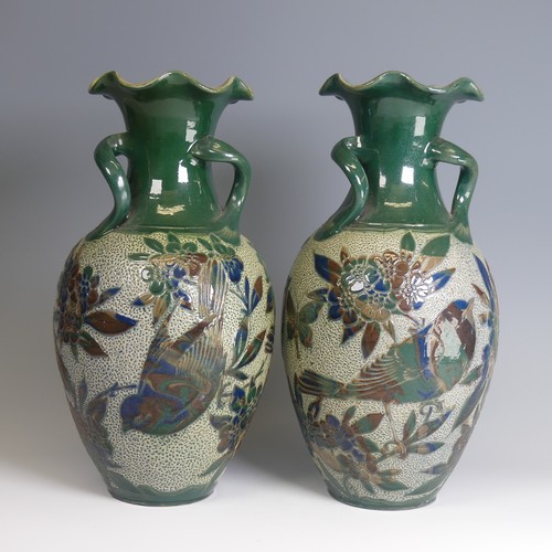 76 - Alexander Lauder, Barum Pottery; a pair of large three-handled Vases, of baluster form, decorated in... 