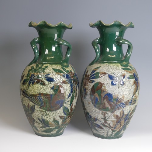 76 - Alexander Lauder, Barum Pottery; a pair of large three-handled Vases, of baluster form, decorated in... 