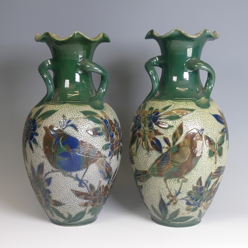 76 - Alexander Lauder, Barum Pottery; a pair of large three-handled Vases, of baluster form, decorated in... 