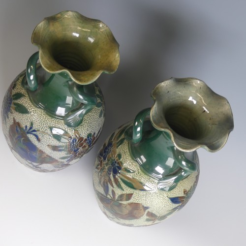 76 - Alexander Lauder, Barum Pottery; a pair of large three-handled Vases, of baluster form, decorated in... 