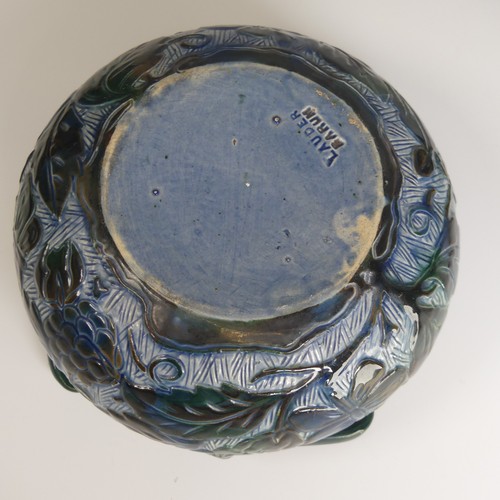 80 - Alexander Lauder, Barum Pottery a four-handled Bowl, decorated with greens, blues and browns of foli... 