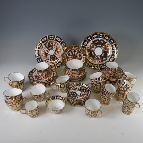 86 - A Royal Crown Derby Imari pattern 2451 tea service, of lobed form, comprising six cups and six sauce... 