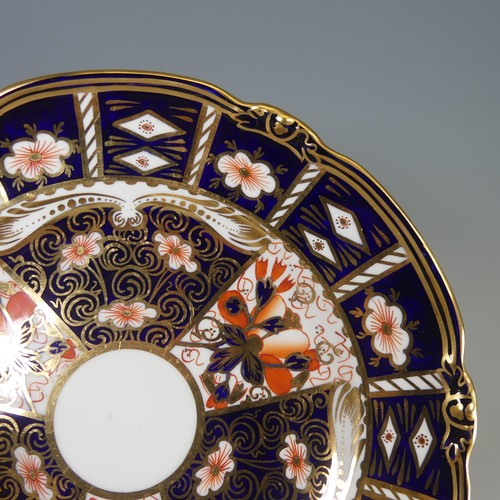 86 - A Royal Crown Derby Imari pattern 2451 tea service, of lobed form, comprising six cups and six sauce... 