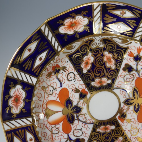 86 - A Royal Crown Derby Imari pattern 2451 tea service, of lobed form, comprising six cups and six sauce... 