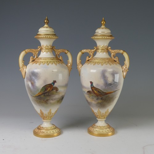 88 - A pair of Royal Worcester twin-handled Vases and covers, painted with Pheasants in naturalistic and ... 