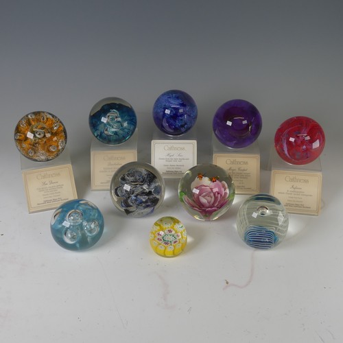 90 - Paperweights: a Caithness Magic Carpet glass paperweight, limited edition 253/750, and four other Ca... 