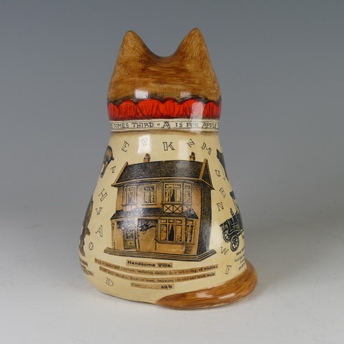 93 - A Joan and David De Bethel, Rye Pottery, Alphabet Cat, with glass eyes and decoupage decoration, the... 