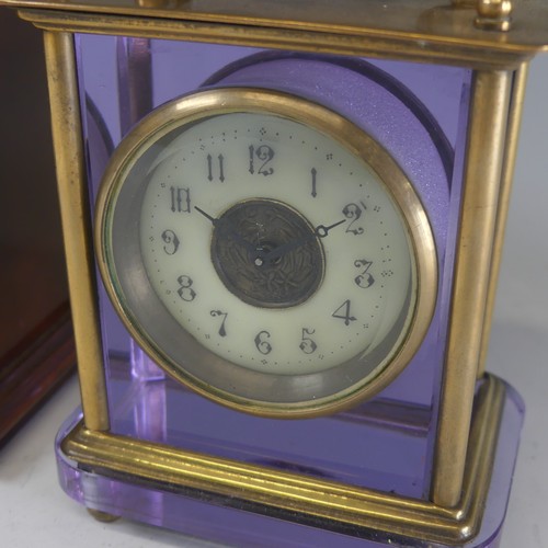 667 - A 20th century brass and purple glass cased carriage Clock, the white dial with Arabic numerals, H 1... 