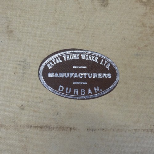 739 - A vintage leather Suitcase, with maker's label for 'Natal Trunk Works Ltd, Manufacturers, Durban', a... 