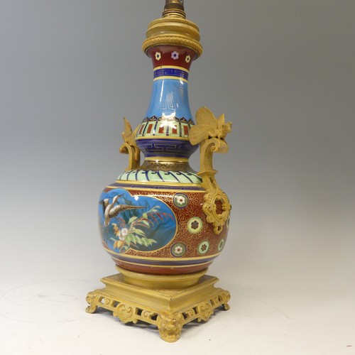 505 - An Aesthetic Movement Table Lamp, probably by Elkington & Co., circa 1880, with painted gilt met... 