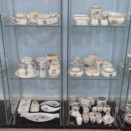 22 - A large quantity of Poole Pottery, decorated in typical style, including Vases, Bowl, Jug, Ashtrays,... 