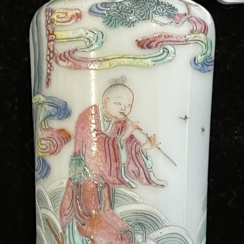 105 - A Chinese famille rose porcelain Snuff Bottle, decorated in fine enamels of an elder riding a dragon... 