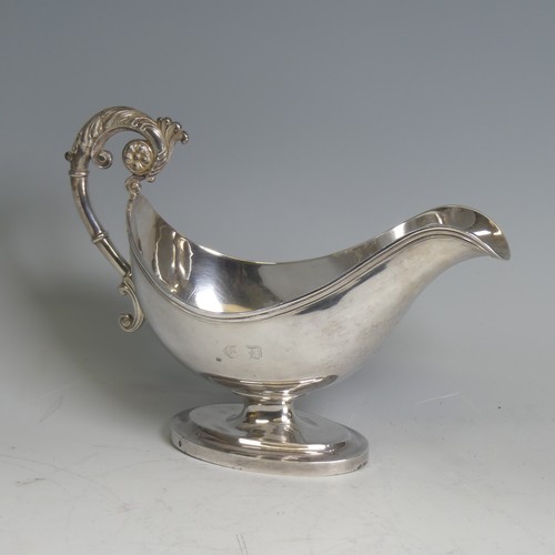 7 - An early 19thC French silver Sauce Boat, with Paris (950) guarantee mark, 1819-1828, of traditional ... 