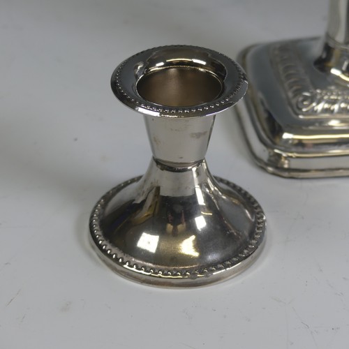 21 - A pair of Edwardian silver Candlesticks, by Ellis & Co., hallmarked Birmingham 1907, with weight... 