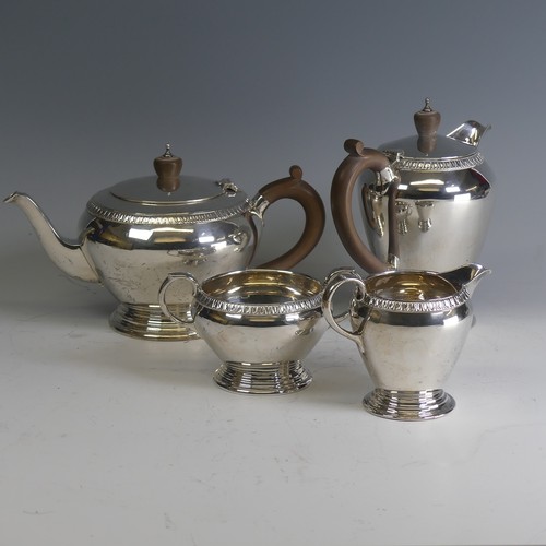  A George VI silver four piece Tea Set, by Wakely & Wheeler, hallmarked London 1948, of circular ... 