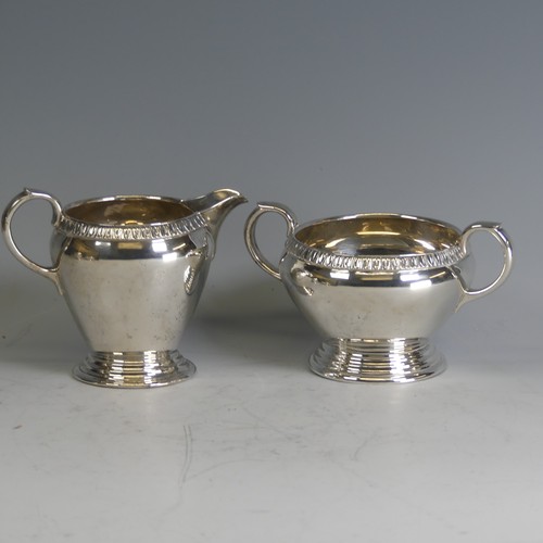  A George VI silver four piece Tea Set, by Wakely & Wheeler, hallmarked London 1948, of circular ... 