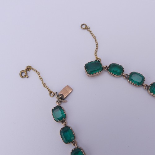  A 19thC green paste rivière Necklace, the graduated cushion shaped emerald green stones in a scallop... 