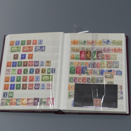  Stamps; A mainly unmounted mint selection of KGV to early QEII Stamps, in a stockbook with sets incl... 